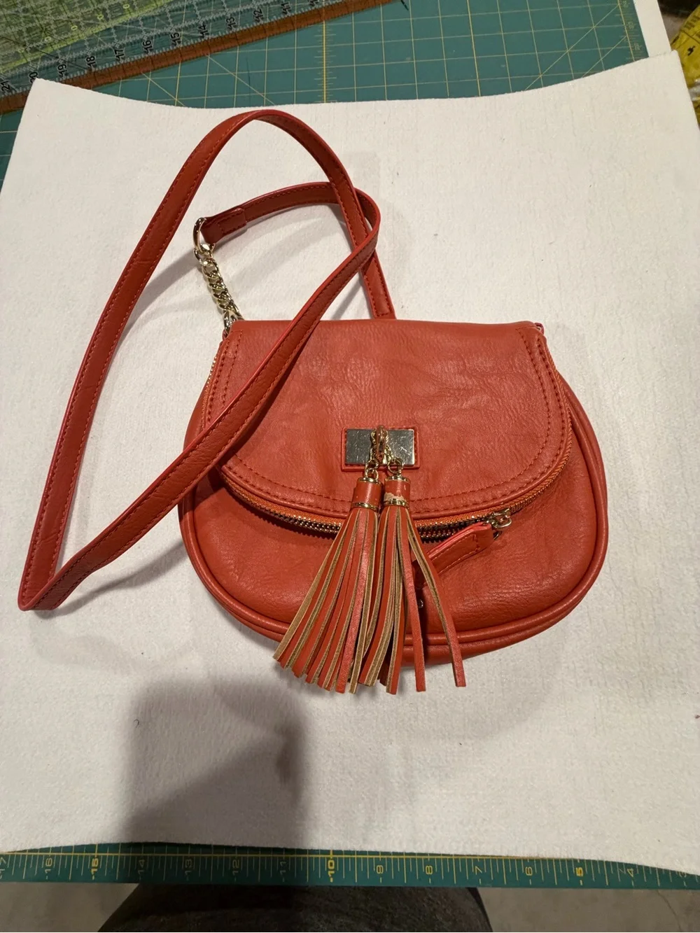 Crossbody Tassel Saddle Bag in pumpkin
